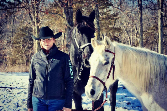 Sydney Kotow, Farrier, with two horses in the snow. Absorbine Blog