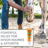 Man in blue jeans bending his horses leg. Absorbine Veterinary Gel powerful relief for minor injuries & athritis.