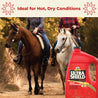 UltraShield® Red insecticide and repellent ideal for hot, dry conditions. Two women trail riding on horses without being nuisanced by biting flies and gnats. 