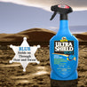 UltraShield Sport, blue holds on through heat and sweat.  UltraShield Sport 32 ounce bottle sitting in the desert with a sheriff's badge next to it.