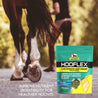 A horse walking with her rider next to her, her frog and sole showing.  Improve nutrient digestibility for healthier hooves. Absorbine Hooflex Concentrated Hoof Builder for all horses. Targeted hoof nutrients, nutritionist formulated, no fillers 90 day supply bag. Net weight 11 lbs.