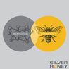 Silver circle of Microsilver BG, over lapping with a dark yellow circle of Manuka honey bee.Silver Honey microsilver bg and manuka honey are a perfect combination for rapid healing
